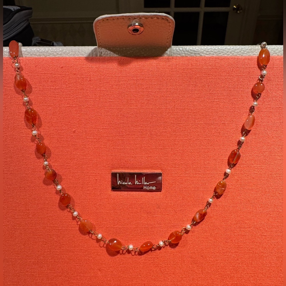 Delicate amber stone and pearl necklace. Made in India